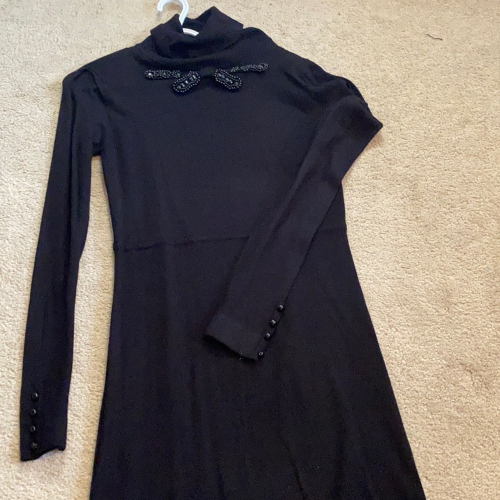 Black mini knit dress with crafted bow